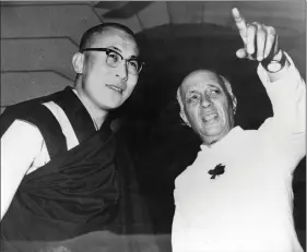  ??  ?? File photo of Dalai Lama and Jawaharlal Nehru. “Without Delhi’s active support, the Chinese troops would not have been able to survive in Tibet,” writes Arpi.