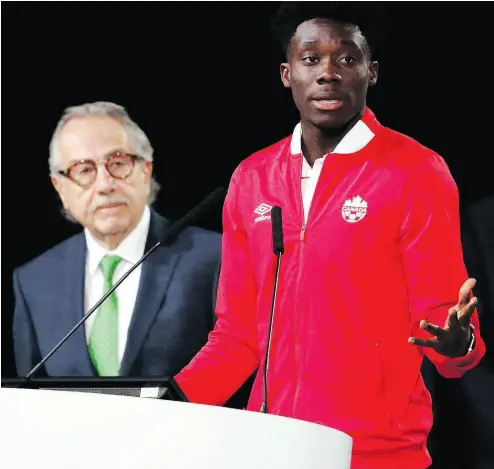  ?? ALEXANDER ZEMLIANICH­ENKO / THE ASSOCIATED PRESS FILES ?? Alphonso Davies speaks at the FIFA congress on the eve of the opener of the 2018 soccer World Cup in Moscow.