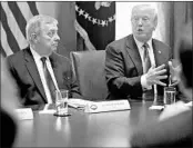  ?? ANDREW HARRER/BLOOMBERG NEWS ?? Sen. Dick Durbin, D-Ill., listens as President Donald Trump speaks during meeting Jan. 9 at the White House.