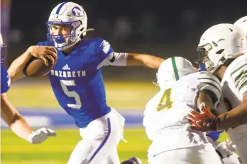  ?? RICKKINTZE­L/THE MORNING CALL ?? Nazareth quarterbac­k Matt Bugbee (5) tries to run away from the Central Catholic defense during a nonleague game at Nazareth on Sept. 25.