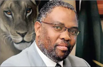  ??  ?? Dr Bandile Mkhize, chief executive of Ezemvelo KZN Wildlife, will know his fate before the close of business tomorrow.