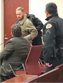  ?? PHAEDRA HAYWOOD/THE NEW MEXICAN ?? Jacob Brown is taken into custody Tuesday after a jury found him guilty of causing great bodily injury by vehicle, leaving the scene of an accident and reckless driving.