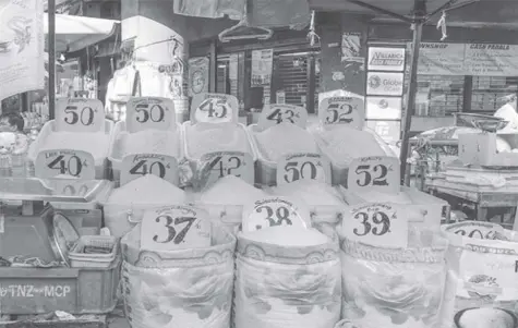  ??  ?? THIS Businessmi­rror file photo shows different varieties of rice being sold at a local market in Manila.