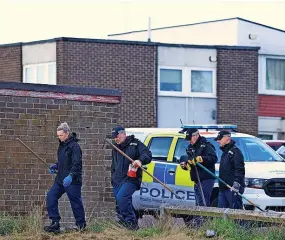  ?? ?? > Police at the scene near Springwell Estate, Gateshead, where Tomasz Oleszak, right, was killed