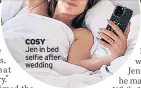  ?? ?? COSY Jen in bed selfie after wedding