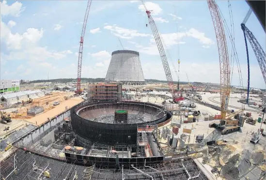  ?? John Bazemore Associated Press ?? DEVELOPERS of the Vogtle nuclear project in Georgia announced costs had swelled to more than $25 billion and predicted completion will be delayed 18 more months.