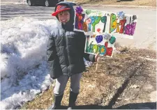 ?? TAYLR SPERO ?? Lincoln Ouellette says the motor-vehicle salute he got in front of his Kanata home for his ninth birthday was “like a parade.”