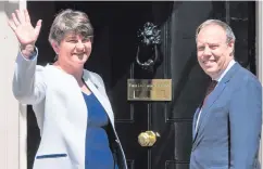  ??  ?? DUP’s Arlene Foster and Nigel Dodds outside Downing Street, and (right) Prime Minister Theresa May