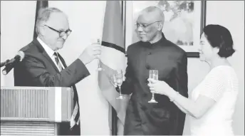  ??  ?? Ambassador Antoine Joly (left) shares a toast with President David Granger and First Lady Sandra Granger. (Ministry of the Presidency photo)