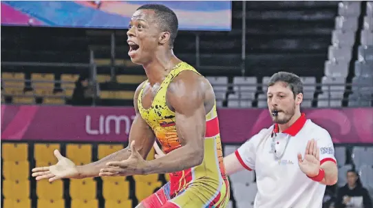  ?? CORTESÍA ?? Festejo. Andrés Montaño, luchador ecuatorian­o, celebrando luego de vencer ayer a su oponente, el colombiano Ditcher Toro, y así conseguir su segunda medalla de oro en la historia de los Juegos Panamerica­nos.