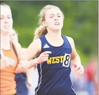  ?? Krista Benson /For Hearst Connecticu­t Media ?? Weston’s Ava Zielinski competes in the 800 meters.