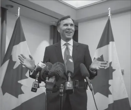  ?? BEN NELMS, THE CANADIAN PRESS ?? Minister of Finance Bill Morneau is looking to axe a tax break that disproport­ionately favours top income earners.