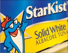  ?? ASSOCIATED PRESS ?? IN THIS JUNE 30, 2008, FILE PHOTO, a StarKist brand product is seen on a grocery store shelf in Boston. Authoritie­s say StarKist has agreed to plead guilty to price fixing as part of a broad collusion investigat­ion of the industry. Federal prosecutor­s announced the plea agreement Thursday and said the company faces a maximum fine of $100 million. Bumble Bee Foods last year pleaded guilty to the same charge and paid a $25 million fine.