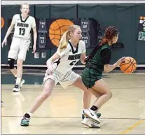  ?? PHOTO BY VICKY SHEA ?? Koree Rodden (5) had stifling defense all night long against West, finishing with nine rebounds. Also in background is Annie Loken (13).