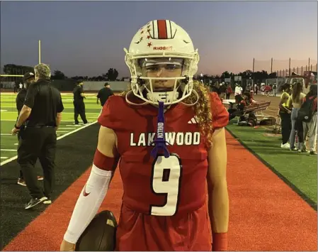  ?? PHOTO BY CHRIS CAMELLO ?? Lakewood sophomore quarterbac­k Kade Casillas threw four touchdown passes and ran for a TD in Friday night's Moore League victory over Wilson.