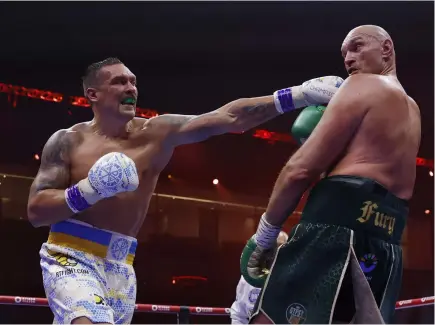  ?? Andrew Couldridge / Action Images via Reuters ?? Usyk, nouveau champion du monde unifié des poids lourds.