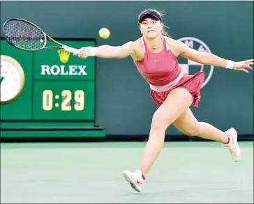  ?? AFP ?? Paula Badosa of Spain reaches for a forehand return to Leylah Fernandez of Canada during their Round 4 match at the Indian Wells tennis tournament on Tuesday.