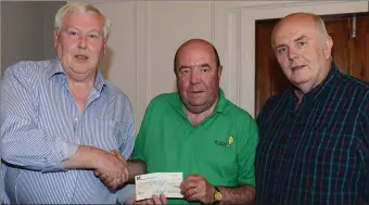  ??  ?? Pascal Nugent and Terry Sands Our Lady of Lourdes Hospital presenting Colin Bell from the Kevin Bell trust with a cheque from the Unite Union at the Westcourt Hotel