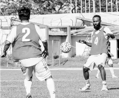  ??  ?? This photograph taken onApril 26,2017 shows formerTott­enham Hotspur midfielder Didier Zokora (R) taking part in a football practice session in Padang, West Sumatra. Former Tottenham Hotspur midfielder Didier Zokora has been released by Semen Padang,...