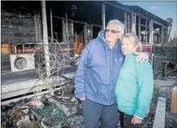  ?? PHOTO/ PAUL TAYLOR ?? The couple were at the site every day following the fire on July 15.