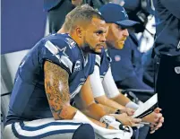  ?? RON JENKINS/THE ASSOCIATED PRESS ?? Cowboys quarterbac­k Dak Prescott has looked lost without running back Ezekiel Elliott in the backfield, throwing two intercepti­ons Thursday, giving him five in two games after throwing just four a year ago.