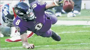  ?? Getty Images ?? IS THIRD TIME THE CHARM? Ravens QB and 2019 NFL MVP Lamar Jackson has yet to win a playoff game in his first two tries. He gets another shot Sunday against the team that ousted Baltimore last season, the Titans.