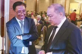  ??  ?? Philex Mining president and CEO Eulalio Austin Jr. and chairman Manny Pangilinan.