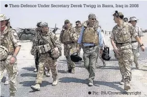  ?? Pic: PA/Crown copyright ?? Then-Defence Under Secretary Derek Twigg in Basra, Iraq in 2008