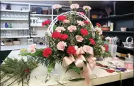  ?? MEGAN DAVIS/MCDONALD COUNTY PRESS ?? Every arrangemen­t is hand-crafted by Dustie Akins, Ashton Bice or Donna Hart. Each of these ladies enjoy floristry as a creative outlet and add their own style to a display.