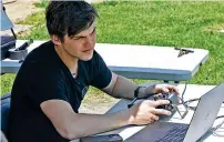  ?? ?? Gus Meyer, a drone pilot at SIC Drones, flies one of the company’s UAV’S on Thursday at the Springfiel­d Beckley Municipal Airport.