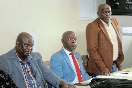  ?? Picture: UVIWE JARA ?? SCHOOL READINESS: From left, Jonguyise Mayongo, Thando Magwentshu and Chris Hani District Municipali­ty speaker Jongumzi Cengani comment on the report given by Luvuyo Lerumo Senior Secondary School principal Simphiwe Tyilana about the readiness of the school.