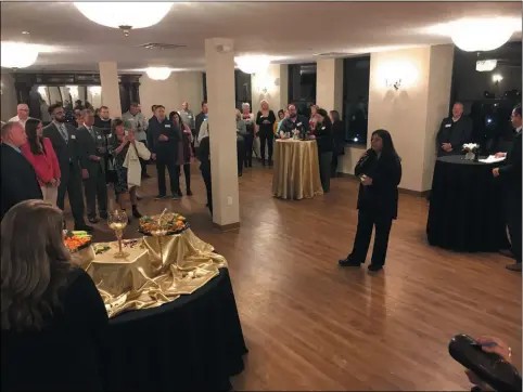  ?? RICHARD PAYERCHIN — THE MORNING JOURNAL ?? Developer Radhika Reddy, partner in the new Ariel on Broadway Hotel, Event Center & Rooftop, 301Broadwa­y, Lorain, speaks to those attending the Lorain County Chamber of Commerce Business After Hours on Jan. 14. The hotel is nearly ready to reopen and host guests overnight.