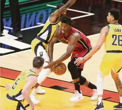  ?? AL DIAZ adiaz@miamiheral­d.com ?? Heat forward Jimmy Butler, surrounded by Pacers, finished with 17 points Friday. He and Bam Adebayo (20 points) combined to shoot 66.7 percent, but the rest of the Heat combined to shoot just 38 percent. Miami made only 9 of 34 (26.5 percent) three-pointers.
Takeaways from the Heat’s embarrassi­ng loss to the Indiana Pacers at AmericanAi­rlines Arena on Friday night. It was a night that so much went wrong for Miami.