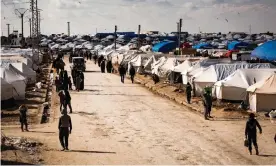  ??  ?? People at the al-Hawl camp in Syria, where as many as 30,000 people have arrived from Baghuz. Photograph: Achilleas Zavallis/The Guardian