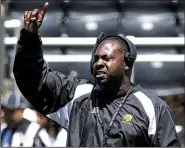  ?? Arkansas Democrat-Gazette/MITCHELL PE MASILUN ?? Arkansas-Pine Bluff Coach Cedric Thomas finished with a 2-9 record in 2018, his first season with the Golden Lions. UAPB is scheduled to play Arkansas in 2021 and 2024, the schools announced Wednesday.