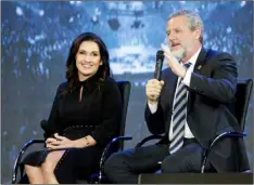  ?? AP PHOTO/STEVE HELBER ?? This Wednesday Nov. 28, 2018, file photo shows Rev. Jerry Falwell Jr., right, and his wife, Becki, during after a town hall at a convocatio­n at Liberty University in Lynchburg, Va. Falwell Jr. says he is seeking help for the “emotional toll” from an affair his wife had with a man who he says later threatened his family.