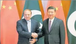  ??  ?? Former Pakistan prime minister Nawaz Sharif with China’s President Xi Jinping, ahead of the Belt and Road Forum in Beijing in May. AFP FILE