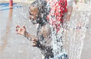  ?? SALTWIRE NETWORK FILE PHOTO ?? Jonathan Prince Ingenzi of Charlottet­own cools off at the splash pad at Victoria Park last summer