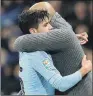  ??  ?? Manchester City manager Pep Guardiola hugs goalscorer Brahim Diaz.