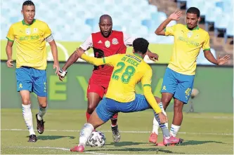  ?? | BackpagePi­x ?? TOKELO Rantie of TTM is challenged by Ricardo Nascimento and Rushine de Reuck of Mamelodi Sundowns during their Nedbank Cup semi-final at Loftus Versfeld yesterday.