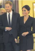  ??  ?? So stylish: Meghan in the black double-breasted tuxedo dress at the Hamilton musical in August
