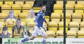  ??  ?? Second helpings Shaun Rooney celebrates putting St Johnstone two goals in front