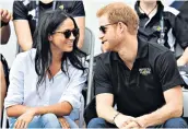  ??  ?? Look of love: Prince Harry went public with his relationsh­ip with American actress Meghan Markle at the Invictus Games in Toronto in September