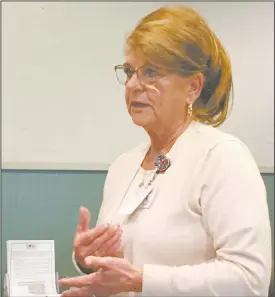  ?? PDN photo by David Seeley ?? Health and Wellness Center/The Pines at Poteau Marketing Director Connie Olcott speaks to members of the Poteau Kiwanis Club during the local civic organizati­on’s weekly meeting Thursday afternoon at Western Sizzlin.