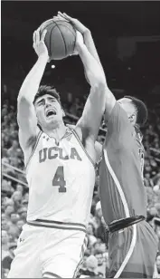  ?? Jayne Kamin-Oncea Getty Images ?? UCLA’S Jaime Jaquez Jr., who scored 11 points, goes up for a shot against Arizona’s Jemarl Baker Jr.