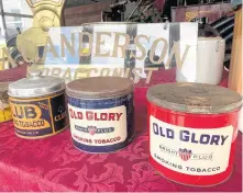  ?? CHRIS CONNORS • CAPE BRETON POST ?? A selection of tobacco tins from Archie Anderson’s store in North Sydney.