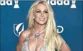  ?? CHRIS PIZZELLO — INVISION/AP, FILE ?? Britney Spears, shown in 2018, hinted she would give a tell-all interview with Oprah Winfrey.