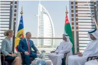  ??  ?? Sheikh Mohamed bin Zayed meets with with Igor Dodon, President of Moldova, against the backdrop of the the Burj Al Arab.