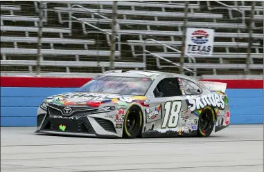  ?? RICHARD W. RODRIGUEZ — THE ASSOCIATED PRESS ?? Kyle Busch drives on the front stretch during the Cup Series race Oct. 28 at Texas Motor Speedway in Fort Worth, Texas.