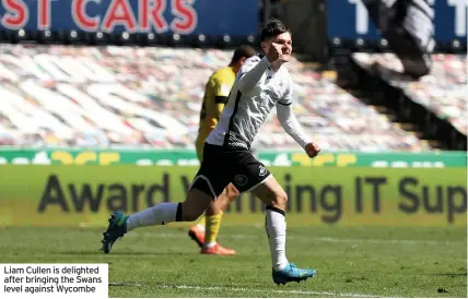  ??  ?? Liam Cullen is delighted after bringing the Swans level against Wycombe